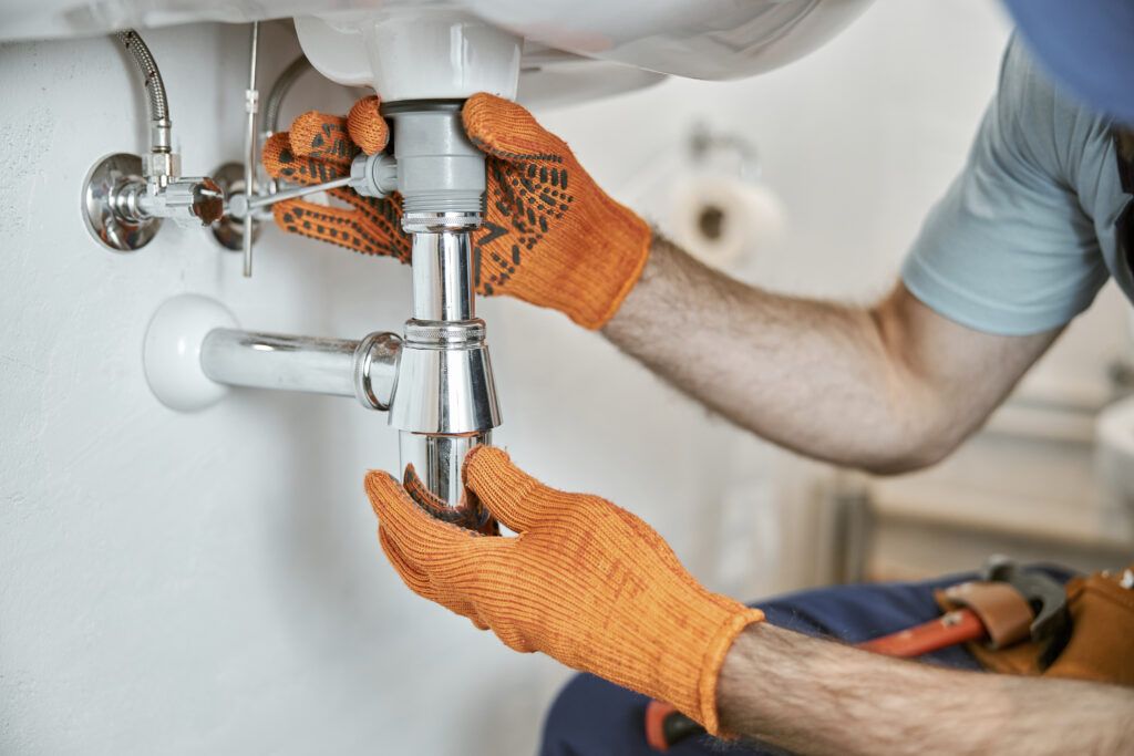 home 10 expert plumber in Kenosha performing repair and installation with modern tools