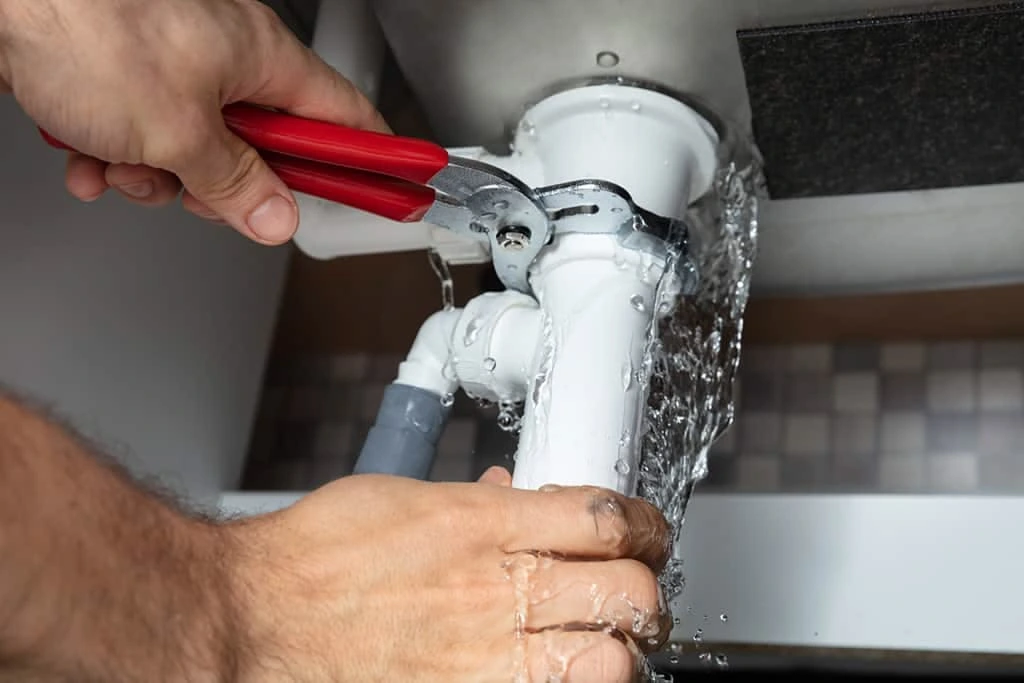 home 13 plumber repairing main water line in Kenosha Wisconsin