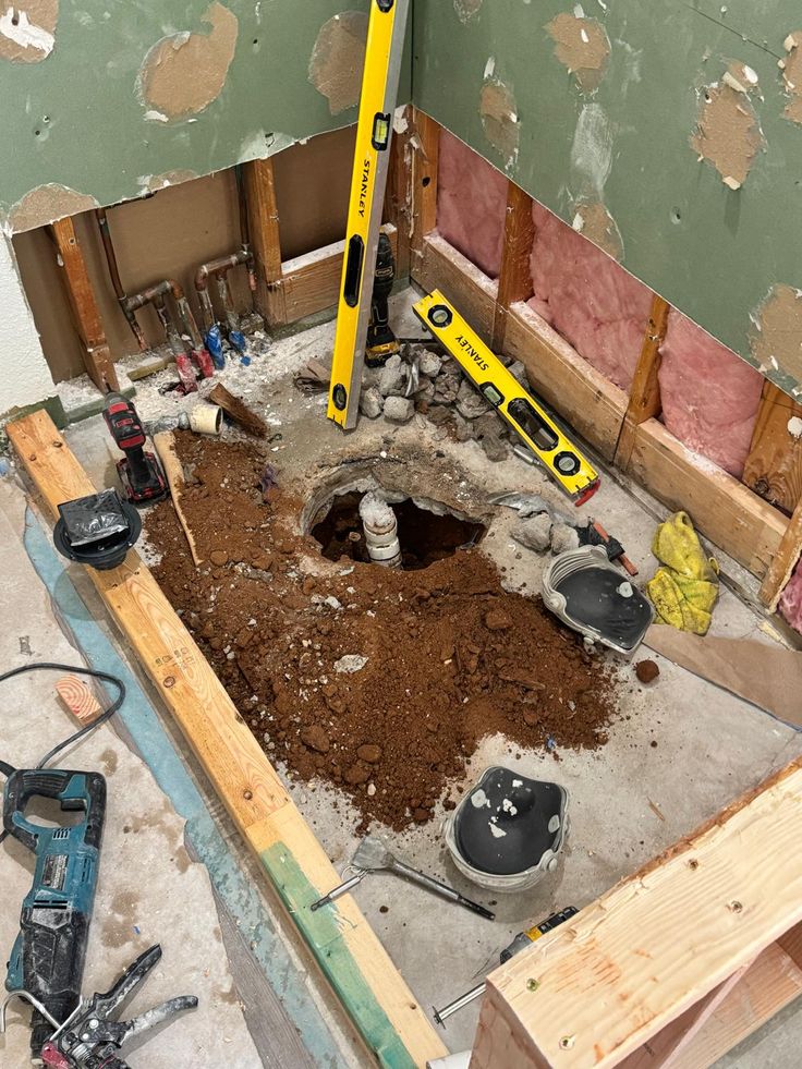 Gallery 6 bathroom plumbing removal in Kenosha showing old pipes and damaged system being removed